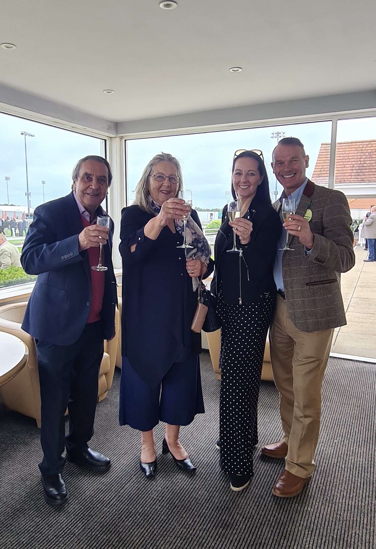Members celebrating Toussarok’s victory at Chelmsford.